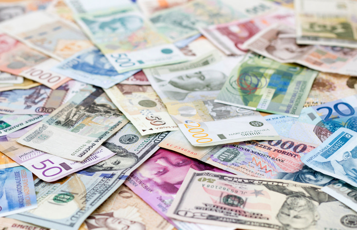 Currency Devaluations and Cross-Border Assignments: